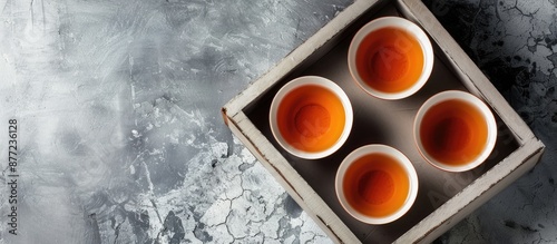 Tea set in a box against a ...