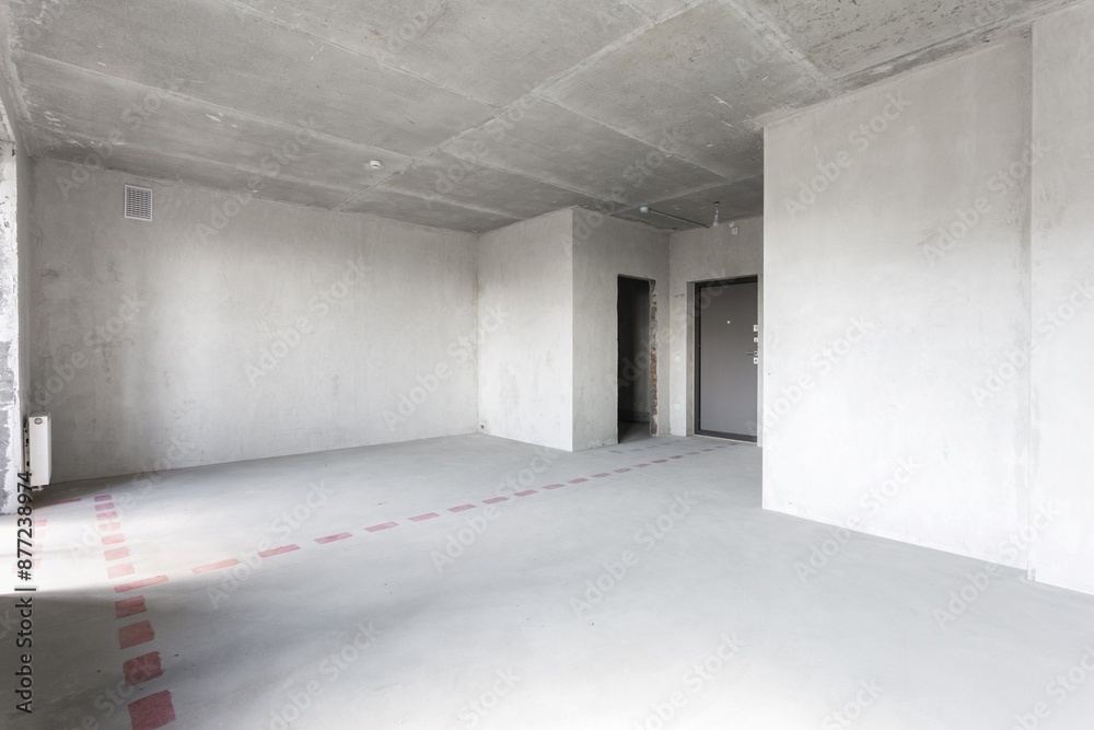 interior of the apartment without decoration in gray colors. rough finish interior of the apartment without decoration in gray colors. rough finish