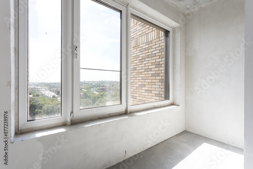 interior of the apartment without decoration in gray colors. rough finish