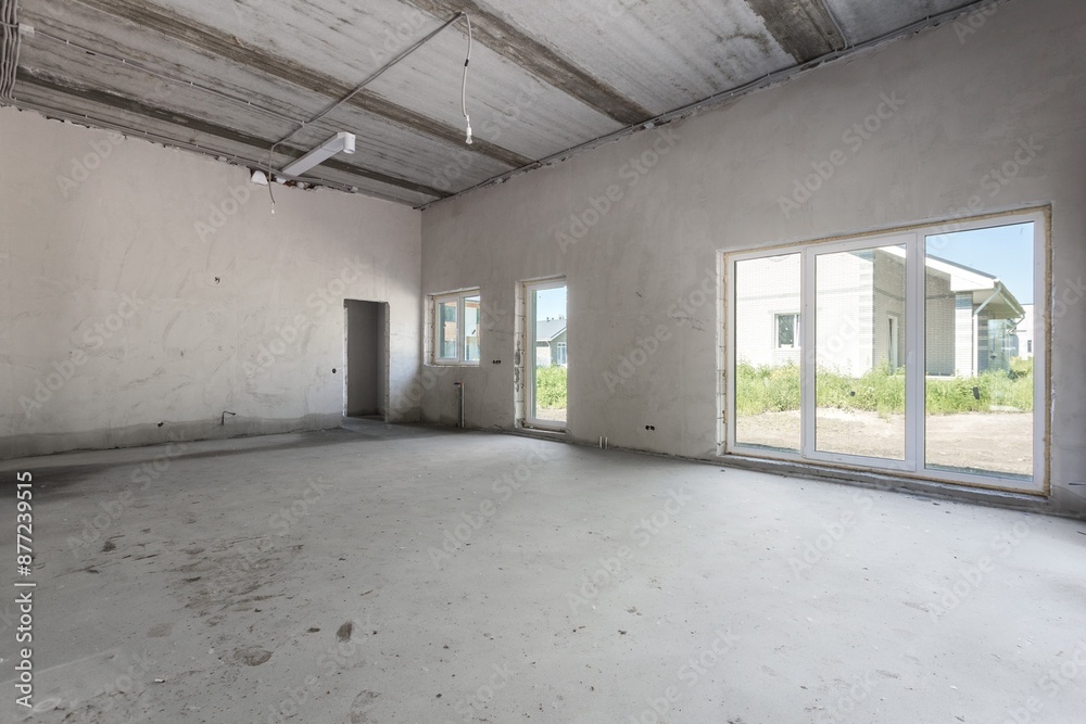interior of the apartment without decoration in gray colors. rough finish interior of the apartment without decoration in gray colors. rough finish
