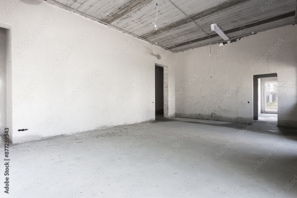 interior of the apartment without decoration in gray colors. rough finish interior of the apartment without decoration in gray colors. rough finish