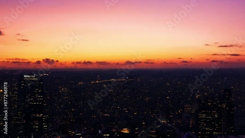 Wallpaper Mural A city skyline is illuminated by the golden hour light of a setting sun. Torontodigital.ca