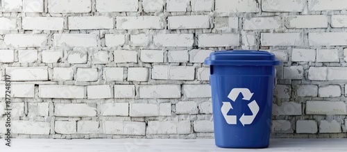 Recycling bin beside electr...