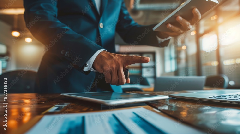 A businessman manages and validates documents and agreements, signs contracts, and approves or confirms warranty certificates with an approval stamp. A businessman manages and validates documents and agreements, signs contracts, and approves or confirms warranty certificates with an approval stamp.