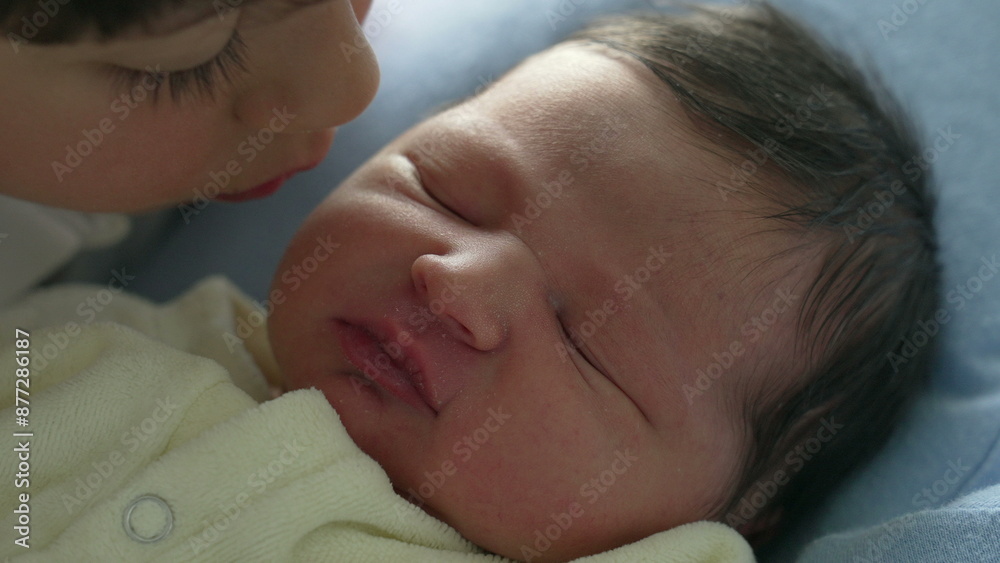 Tender Moment Between Siblings, with Older Brother Kissing Newborn Baby's Cheek, Capturing Love and Bond in a Soft, Intimate Close-Up Tender Moment Between Siblings, with Older Brother Kissing Newborn Baby's Cheek, Capturing Love and Bond in a Soft, Intimate Close-Up