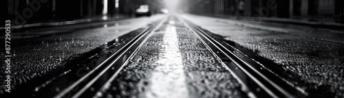 Moody black and white street scene in rain