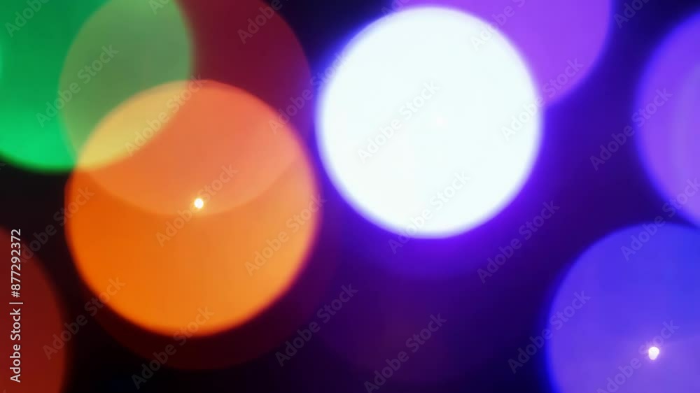 Vibrant and dynamic bokeh circles of various colors gently pulsing and overlapping, creating a colorful and festive light background Vibrant and dynamic bokeh circles of various colors gently pulsing and overlapping, creating a colorful and festive light background
