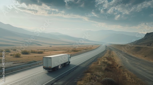 A truck with a white empty trailer on a highway with beautiful nature, photo