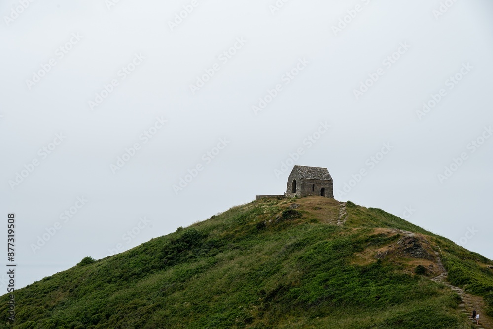 Rame Head Chapel located on a high cliff in the Mount Edgcumbe Country Park Cornwall England on a misty summer day Rame Head Chapel located on a high cliff in the Mount Edgcumbe Country Park Cornwall England on a misty summer day