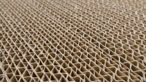 Stack of corrugated cardboard carton side view. Folded carton cross section, close-up view