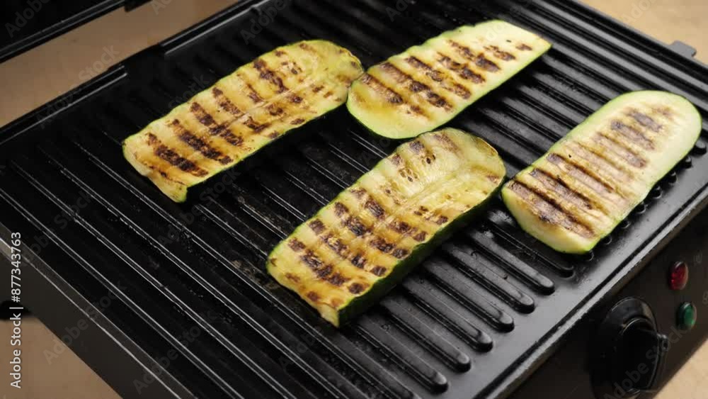 grilled vegetables. Healthy vegetarian food. Cooking zucchini on an electric grill