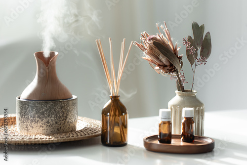 Spa composition with incense sticks, air humidifier and aroma oils.