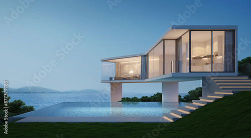 Canvas Print Modern house with sea view and swimming pool.3d rendering