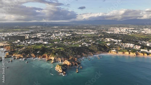 Beautiful view of the Portuguese coastline at sunset. Alvor village, Algarve