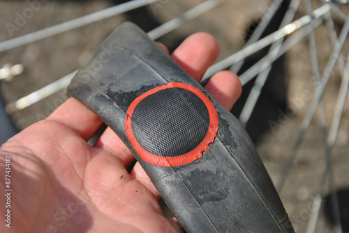 bicycle inner tube repair. patch on bicycle inner tube
