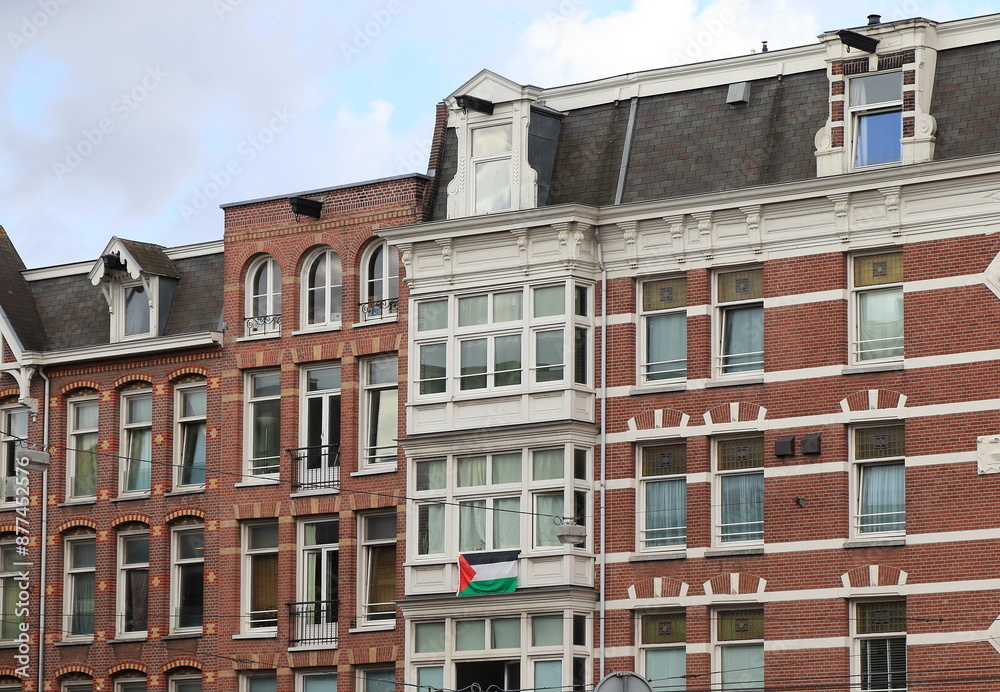 Naklejka premium Amsterdam Korte Marnixstraat House Facades with Palestinian Flag, Netherlands