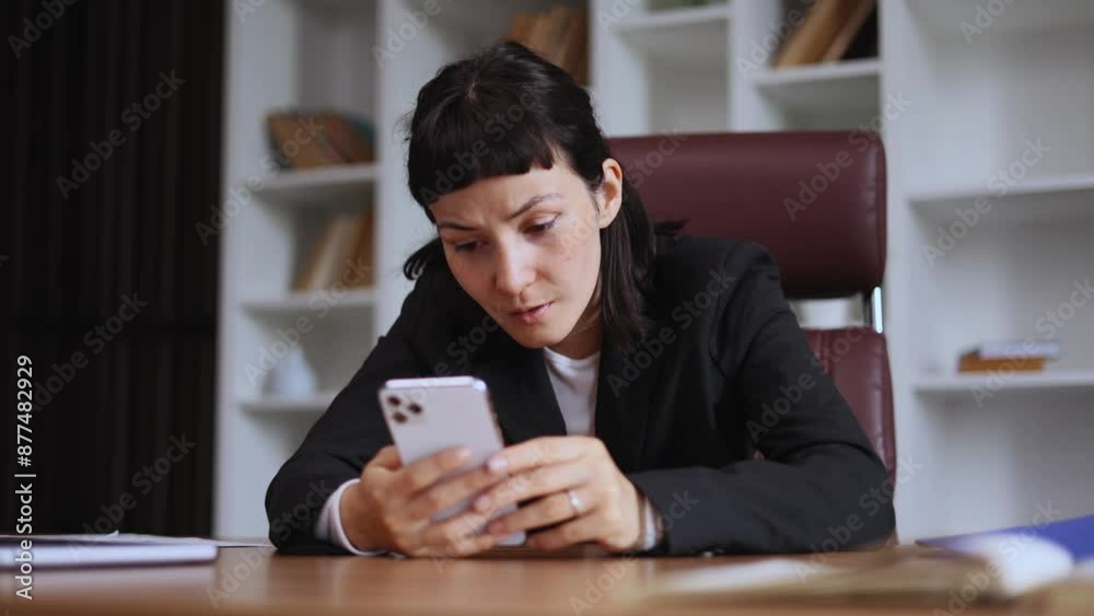 Portrait of amazed young businesswoman got notification message and looking at screen with puzzled face at office Shocked beautiful female reacting to news and feel confused indoors Portrait of amazed young businesswoman got notification message and looking at screen with puzzled face at office Shocked beautiful female reacting to news and feel confused indoors