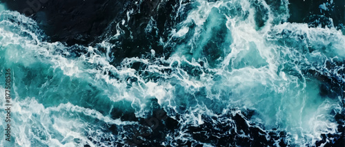 Natural background of blue-green sea water with foam.