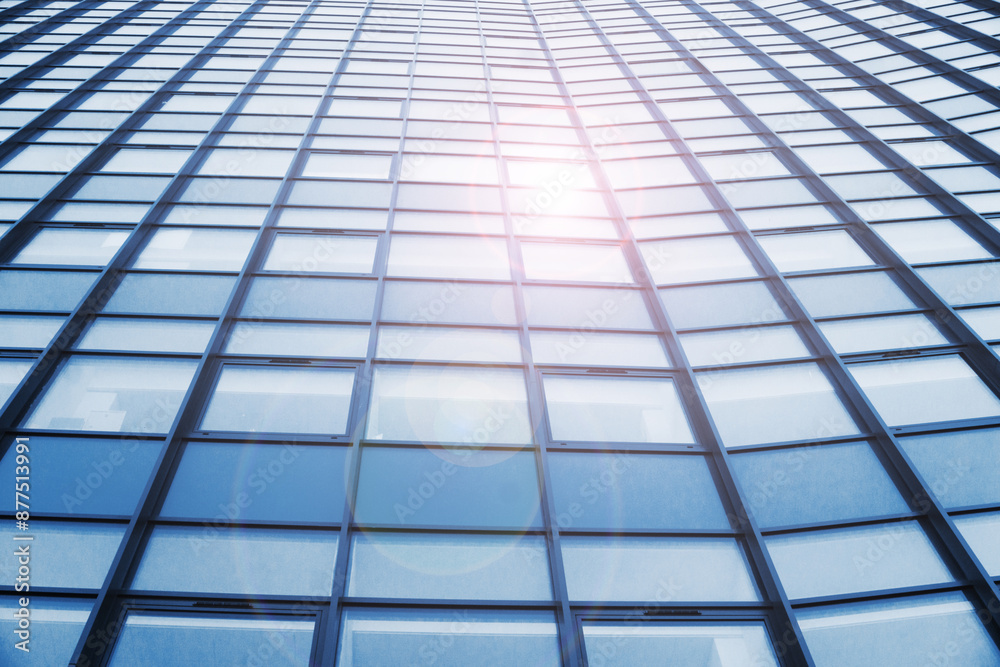 Office building texture. Glass skyscraper background. Glass window building. Sunny day architecture. Window sunlight reflection. Bright warm sunbeam on cold glass. Office building texture. Glass skyscraper background. Glass window building. Sunny day architecture. Window sunlight reflection. Bright warm sunbeam on cold glass.