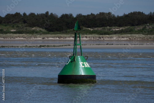 Guiding Light: Green Buoy at La Canche, Le Touquet photo