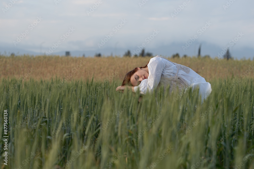 Young woman dancing outdoors. Modern dance performance in the meadow field. Carefree and freedom in nature Young woman dancing outdoors. Modern dance performance in the meadow field. Carefree and freedom in nature