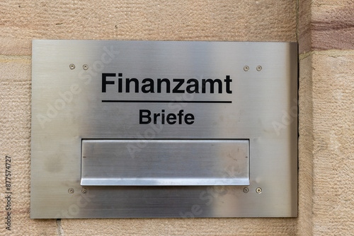 Briefkasten am Finanzamt mit der Aufschrift Finanzamt Briefe. photo