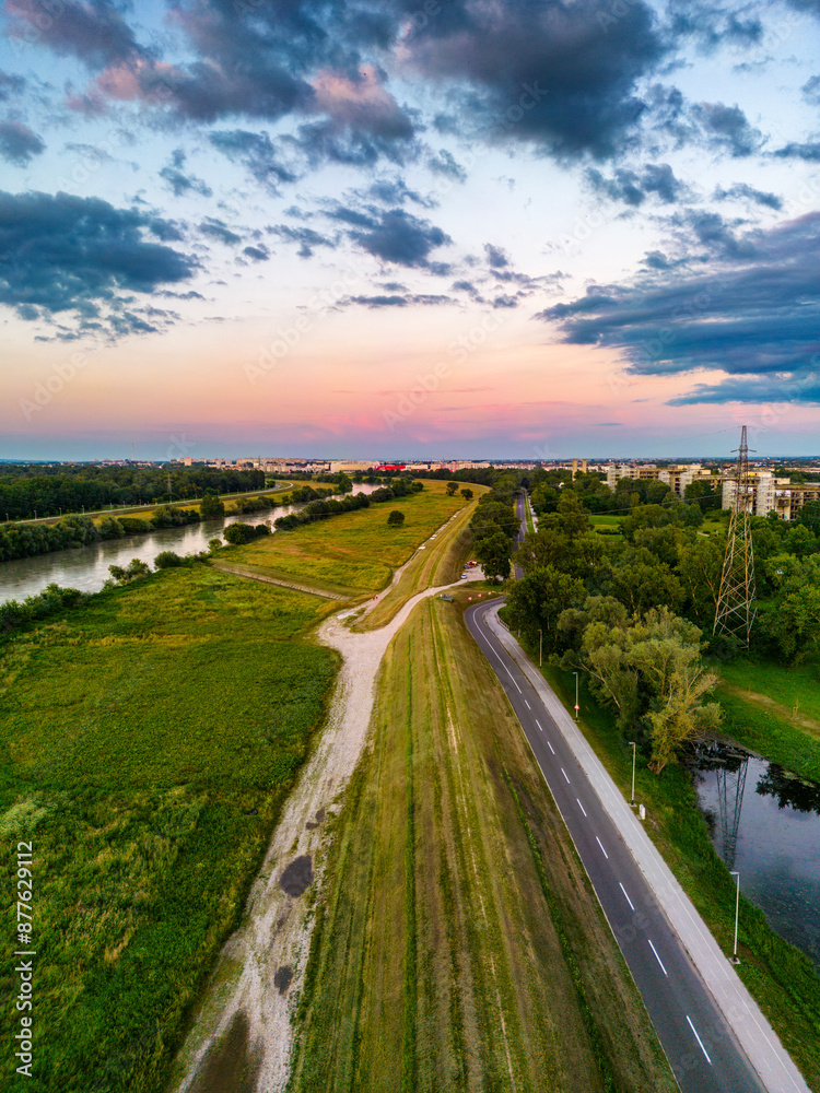 Aerial view of road passing next to the Sava river embankment on the southern side of Zagreb city, Croatia, at sunset Aerial view of road passing next to the Sava river embankment on the southern side of Zagreb city, Croatia, at sunset
