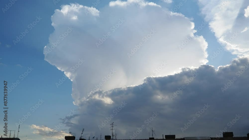 Beautiful clouds in sky. Volumetric light cumulus effect. The sunrays are hidden behind dark clouds. Convection in troposphere. Movement of moisture in atmosphere. Time lapse. Weather forecast Beautiful clouds in sky. Volumetric light cumulus effect. The sunrays are hidden behind dark clouds. Convection in troposphere. Movement of moisture in atmosphere. Time lapse. Weather forecast