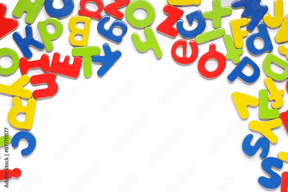 Alphabet. Many colorful magnetic letters isolated on white, top view Alphabet. Many colorful magnetic letters isolated on white, top view