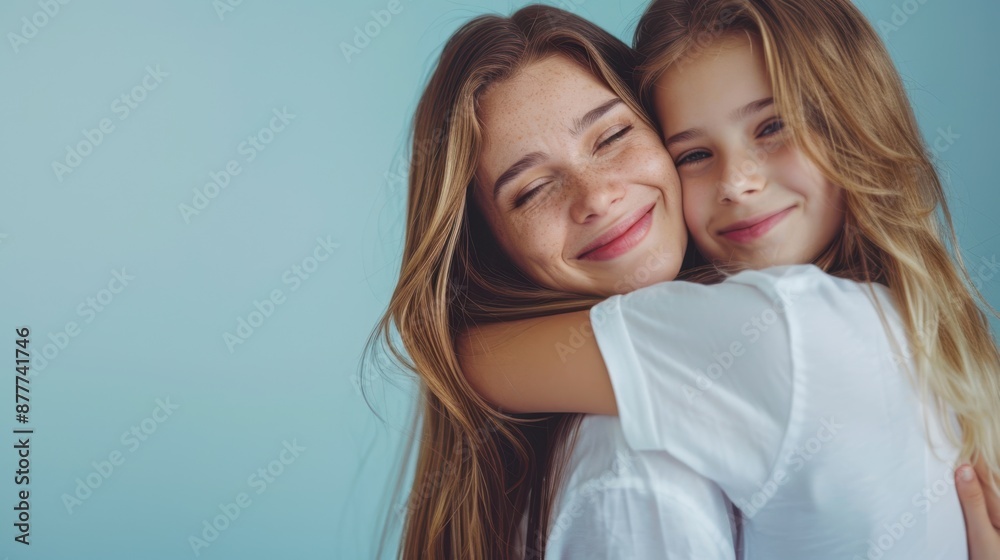 The happy sisters hugging. The happy sisters hugging.