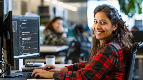 The female programmer at desk photo