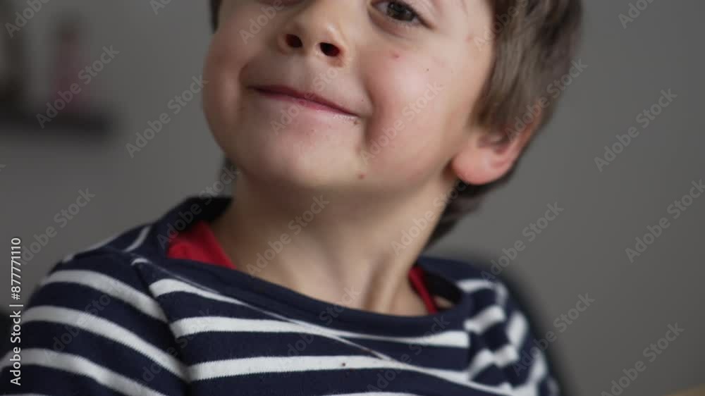 Smiling Boy Resting His Head On A Wooden Table Wearing A Striped Shirt, Showcasing Joy And Playfulness In A Cozy Indoor Setting, Capturing A Candid Moment Of Childhood Happiness And Innocence Smiling Boy Resting His Head On A Wooden Table Wearing A Striped Shirt, Showcasing Joy And Playfulness In A Cozy Indoor Setting, Capturing A Candid Moment Of Childhood Happiness And Innocence