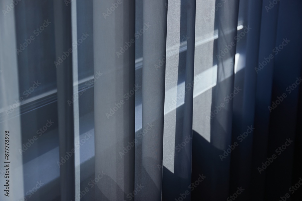 Fotografie Curtain in a plain hotel room window