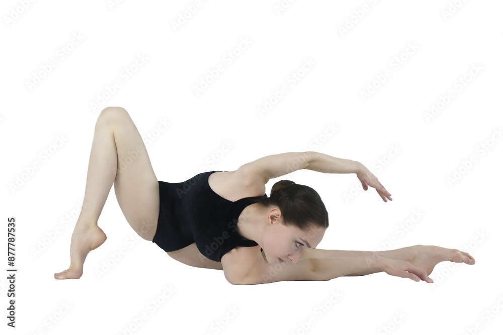young ballerina in a dark bodysuit sitting on the floor shows stretching and eversion of her arms young ballerina in a dark bodysuit sitting on the floor shows stretching and eversion of her arms