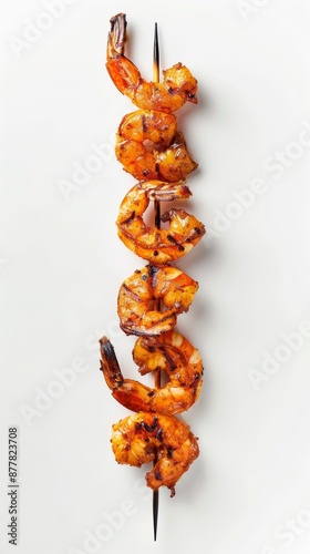 Grilled shrimp skewer delicacy: Presented alone on a pure white background, showcasing the tempting flavors of summer barbecue photo