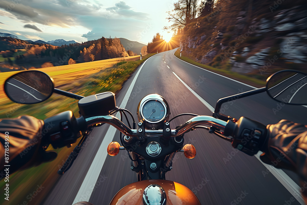 Naklejka premium Biker driving a motorcycle rides along the asphalt road. First-person view.