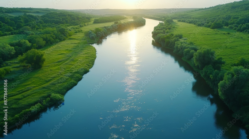 A scenic summer landscape with a river winding through a lush green forest with a glimpse of a calm lake nestled among the trees A scenic summer landscape with a river winding through a lush green forest with a glimpse of a calm lake nestled among the trees