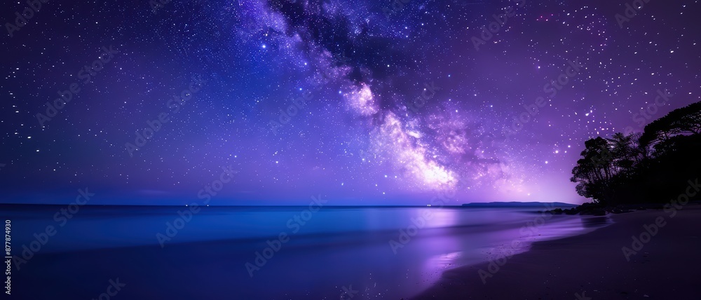 Stunning Night Sky with Milky Way Over Tranquil Beach and Ocean Horizon Stunning Night Sky with Milky Way Over Tranquil Beach and Ocean Horizon