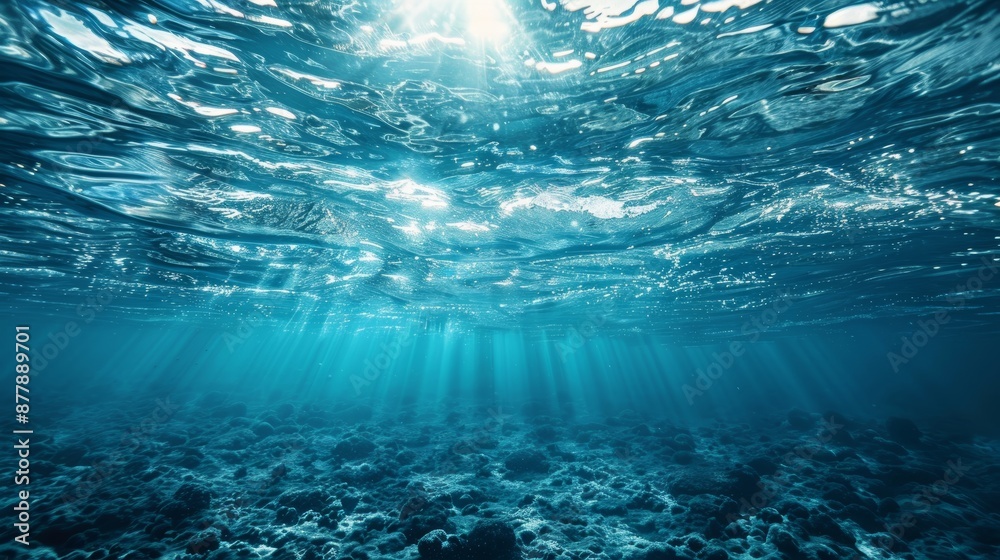 Naklejka premium Sunbeams illuminate the ocean floor,creating a breathtaking underwater landscape. background or website design.
