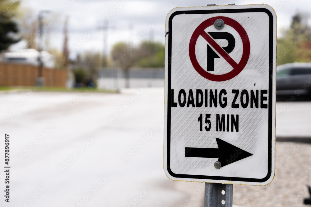 15 minutes loading zone sign in a parking lot 15 minutes loading zone sign in a parking lot