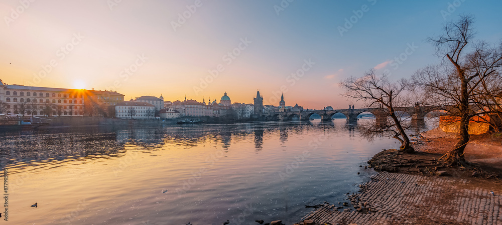 Obraz premium View of the city of Prague. Vltava river with Old Town Bridge Tower on Charles bridge in Prague, Czech Republic.