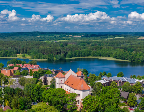 Trakai Church of the Visitation of the Blessed Virgin Mary in Trakai, Lithuania. Aerial drone view with a panoramic church view among lakes