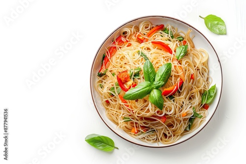 Flavorful and colorful noodles with vegetables and basil photo
