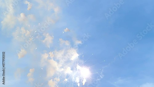 Mascleta fireworks exploding in the bright clear blue sky in the daytime in Valencia city, Spain. Backgrounds. Fallas festival