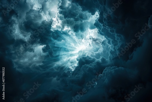 A burst of light breaking through a dark cloud, representing hope. © Alex