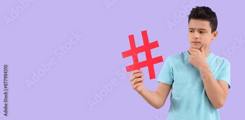 Thoughtful teenage boy with...