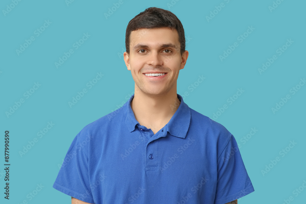 Handsome young man in stylish t-shirt on blue background, closeup Handsome young man in stylish t-shirt on blue background, closeup