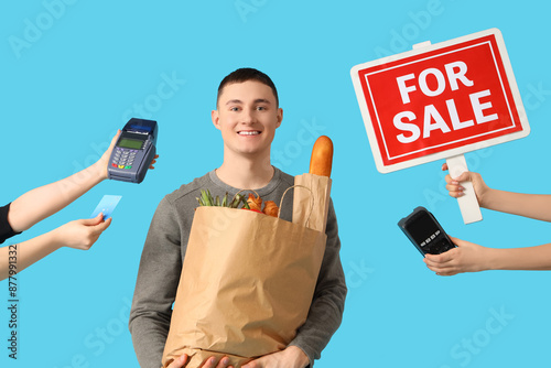 Young man with shopping bag...