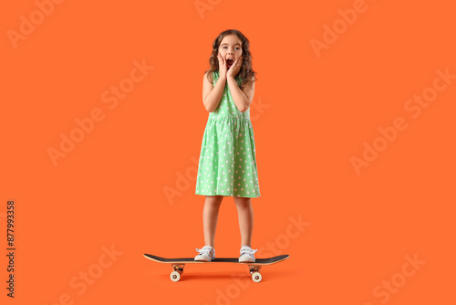 Shocked little girl with sk...