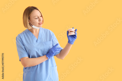 Female dentist or dental as...
